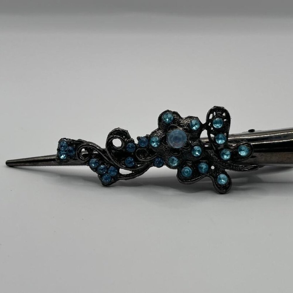 Beautiful antiqued floral design hair pin with rhinestones